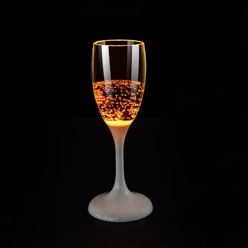 Lysende champagneglas