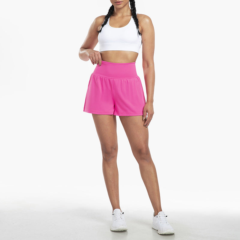 Højtaljede sportsshorts i falsk todelt design