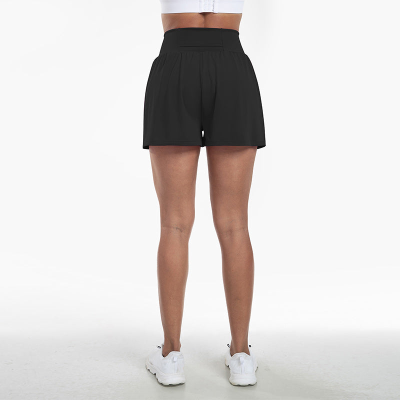 Højtaljede sportsshorts i falsk todelt design