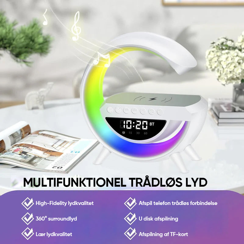 G-formet LED lampe og højtaler med trådløs opladning