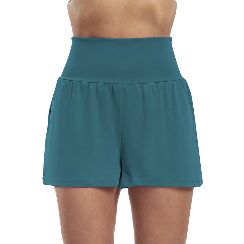 Højtaljede sportsshorts i falsk todelt design