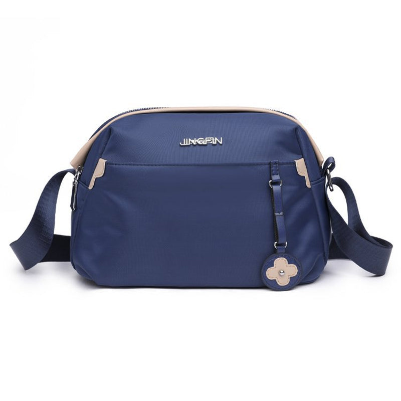 Crossbody taske med stor kapacitet